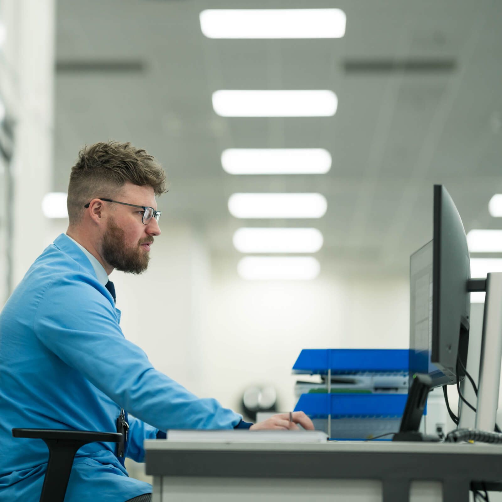 man-working-at-desk.png